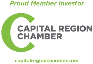 The Capital Region Chamber logo, featuring a large green stylized "C" and the words "CAPITAL REGION CHAMBER" in dark grey text. Above it, "Proud Member Investor" is in green, and below, "capitalregionchamber.com" is also in green.