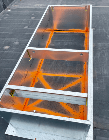 Metal exhaust frame on roof ready for installation