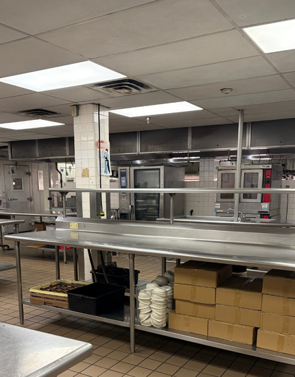 commercial kitchen at the sagamore featuring various commercial kitchen equipment